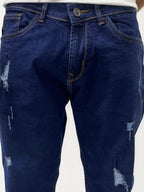 Dark blue distressed slim fit jeans