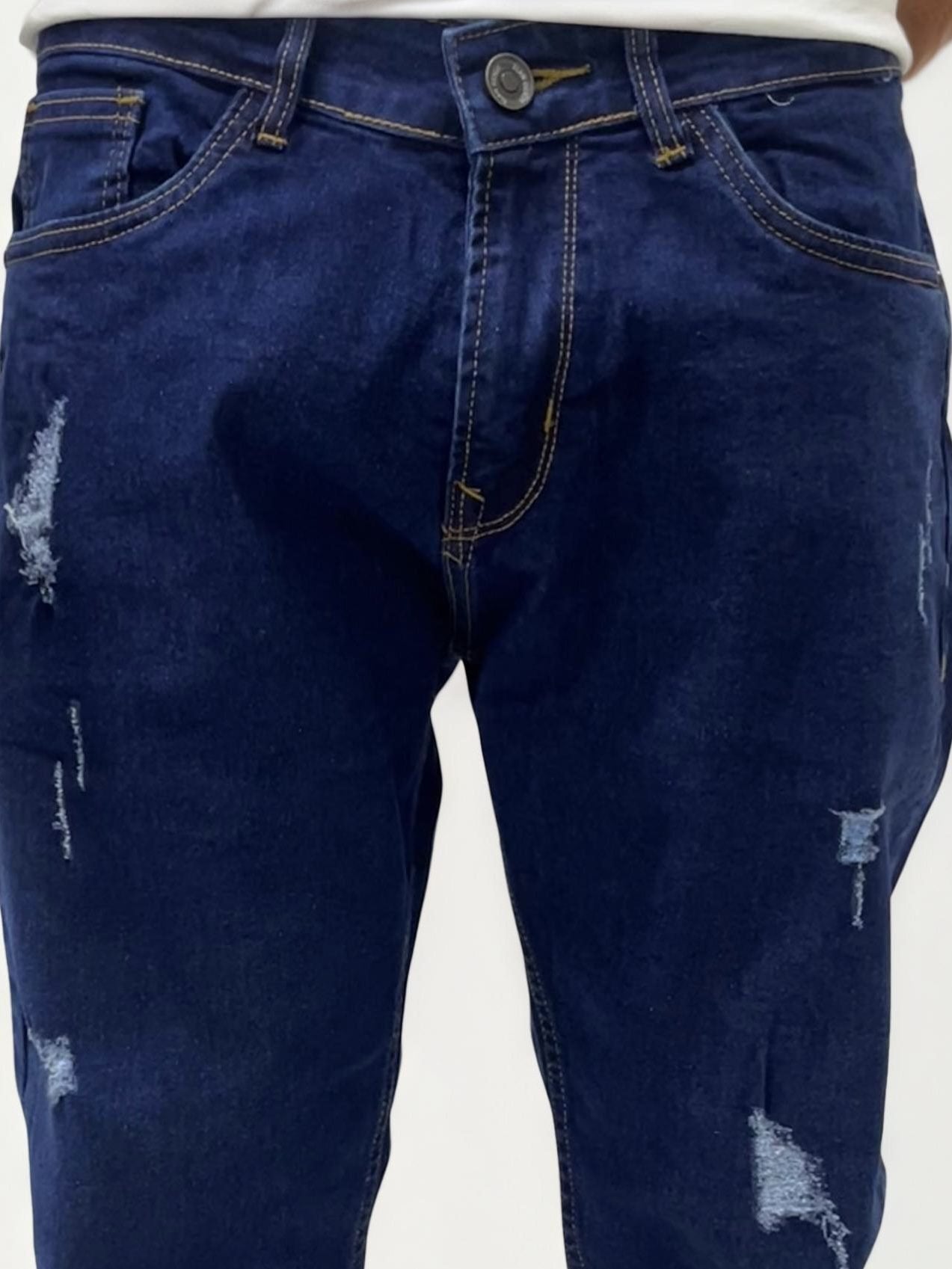 Dark blue distressed slim fit jeans
