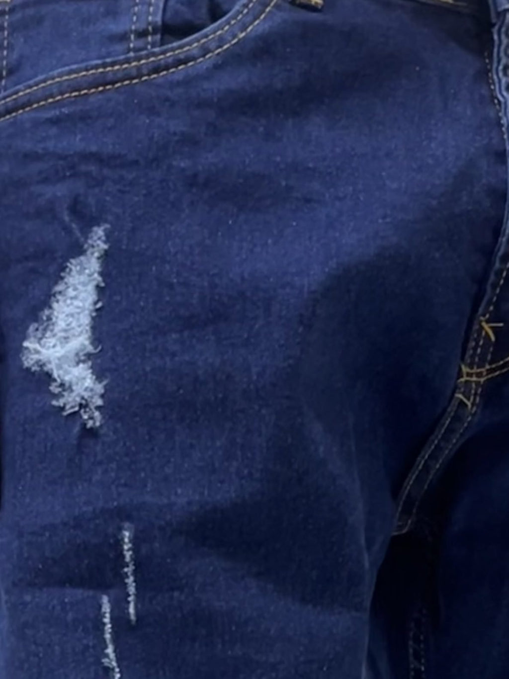 Dark blue distressed slim fit jeans