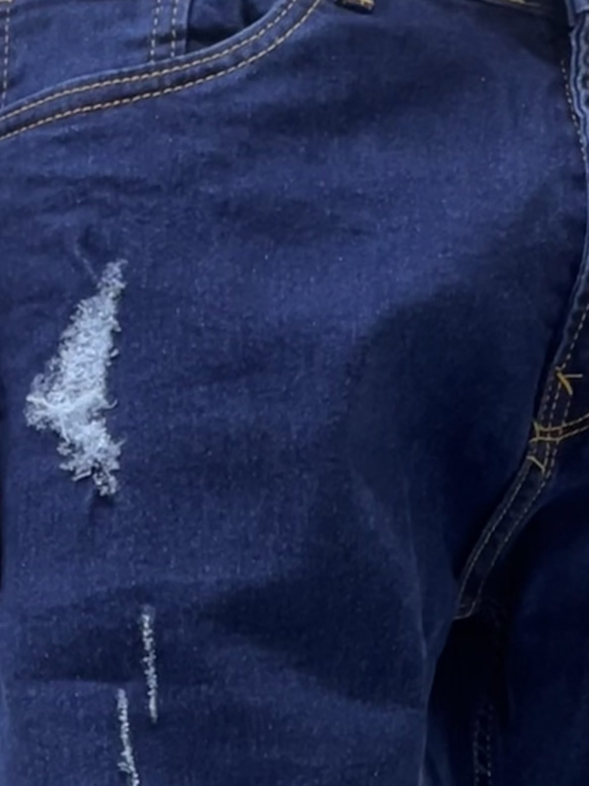 Dark blue distressed slim fit jeans